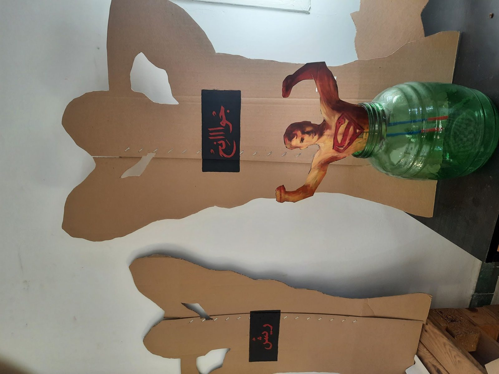 Cardboard cutouts on the studio floor